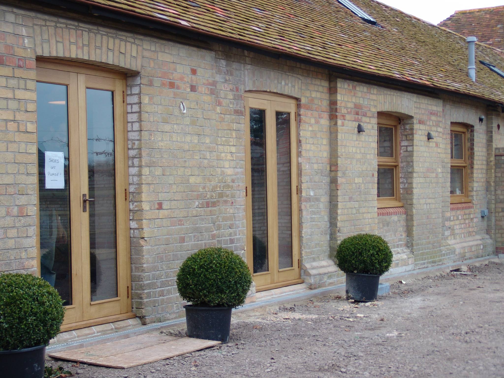 Joinery on Buff Brick Barn